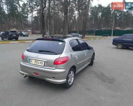 Сірий Пежо 206, об'ємом двигуна 1.36 л та пробігом 260 тис. км за 3000 $, фото 4 на Automoto.ua
