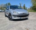 Серый Пежо 206, объемом двигателя 1.59 л и пробегом 167 тыс. км за 3499 $, фото 1 на Automoto.ua