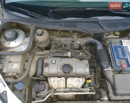 Сірий Пежо 206, об'ємом двигуна 1.36 л та пробігом 260 тис. км за 3000 $, фото 10 на Automoto.ua