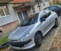 Сірий Пежо 206, об'ємом двигуна 1.4 л та пробігом 230 тис. км за 3500 $, фото 1 на Automoto.ua