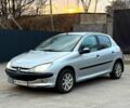 Серый Пежо 206, объемом двигателя 1.4 л и пробегом 200 тыс. км за 2550 $, фото 1 на Automoto.ua