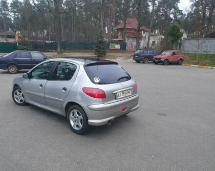 Серый Пежо 206, объемом двигателя 1.4 л и пробегом 260 тыс. км за 3000 $, фото 3 на Automoto.ua