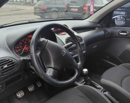 Серый Пежо 206, объемом двигателя 1.4 л и пробегом 165 тыс. км за 3500 $, фото 13 на Automoto.ua