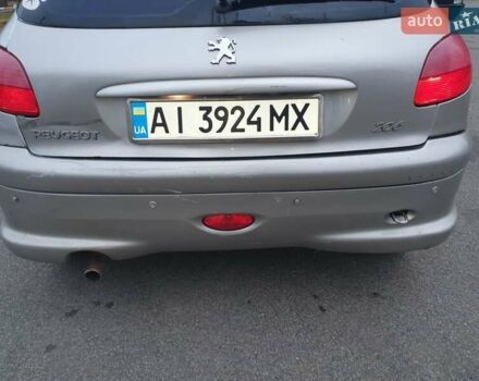Сірий Пежо 206, об'ємом двигуна 1.36 л та пробігом 260 тис. км за 3000 $, фото 6 на Automoto.ua