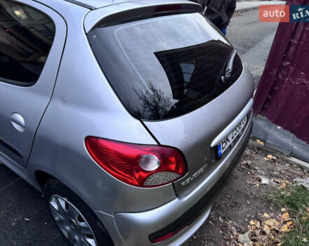 Серый Пежо 206, объемом двигателя 1.36 л и пробегом 278 тыс. км за 3250 $, фото 17 на Automoto.ua