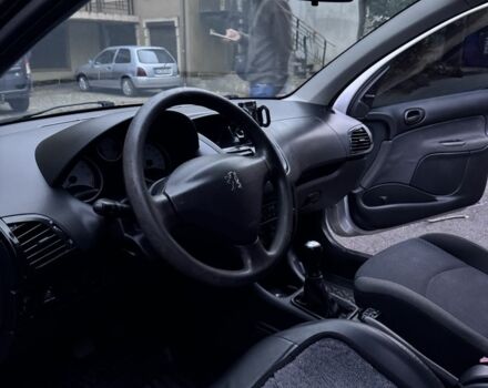 Серый Пежо 206, объемом двигателя 1.4 л и пробегом 278 тыс. км за 3250 $, фото 9 на Automoto.ua