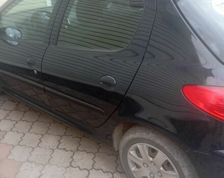 Серый Пежо 206, объемом двигателя 1.1 л и пробегом 124 тыс. км за 4300 $, фото 4 на Automoto.ua