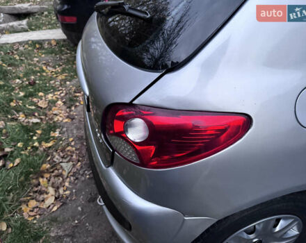 Серый Пежо 206, объемом двигателя 1.36 л и пробегом 278 тыс. км за 3250 $, фото 18 на Automoto.ua