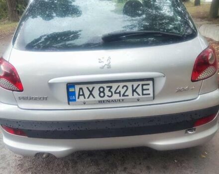 Серый Пежо 206, объемом двигателя 1.4 л и пробегом 166 тыс. км за 4800 $, фото 3 на Automoto.ua