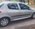 Серый Пежо 206, объемом двигателя 1.4 л и пробегом 166 тыс. км за 4800 $, фото 2 на Automoto.ua