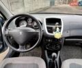 Серый Пежо 206, объемом двигателя 1.36 л и пробегом 180 тыс. км за 4200 $, фото 5 на Automoto.ua