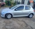 Серый Пежо 206, объемом двигателя 1.4 л и пробегом 211 тыс. км за 4450 $, фото 1 на Automoto.ua