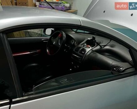 Сірий Пежо 206, об'ємом двигуна 1.59 л та пробігом 181 тис. км за 4000 $, фото 1 на Automoto.ua