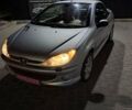 Сірий Пежо 206, об'ємом двигуна 2 л та пробігом 244 тис. км за 4999 $, фото 4 на Automoto.ua