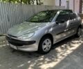 Серый Пежо 206, объемом двигателя 1.1 л и пробегом 220 тыс. км за 1599 $, фото 1 на Automoto.ua