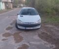 Серый Пежо 206, объемом двигателя 1.4 л и пробегом 280 тыс. км за 1750 $, фото 1 на Automoto.ua