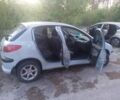 Серый Пежо 206, объемом двигателя 1.4 л и пробегом 280 тыс. км за 1750 $, фото 3 на Automoto.ua
