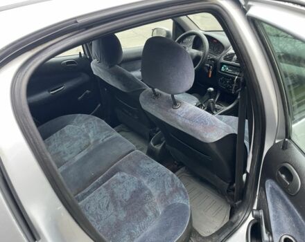 Серый Пежо 206, объемом двигателя 1.9 л и пробегом 220 тыс. км за 1299 $, фото 13 на Automoto.ua