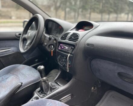 Серый Пежо 206, объемом двигателя 1.9 л и пробегом 220 тыс. км за 1299 $, фото 12 на Automoto.ua