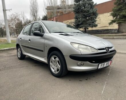 Серый Пежо 206, объемом двигателя 1.9 л и пробегом 220 тыс. км за 1299 $, фото 1 на Automoto.ua