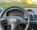 Сірий Пежо 206, об'ємом двигуна 1.1 л та пробігом 270 тис. км за 1600 $, фото 6 на Automoto.ua