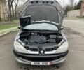 Серый Пежо 206, объемом двигателя 1.9 л и пробегом 220 тыс. км за 1299 $, фото 20 на Automoto.ua