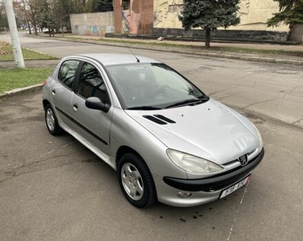 Серый Пежо 206, объемом двигателя 1.9 л и пробегом 220 тыс. км за 1299 $, фото 2 на Automoto.ua