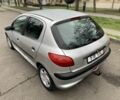 Серый Пежо 206, объемом двигателя 1.9 л и пробегом 220 тыс. км за 1299 $, фото 6 на Automoto.ua