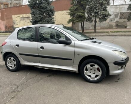 Серый Пежо 206, объемом двигателя 1.9 л и пробегом 220 тыс. км за 1299 $, фото 3 на Automoto.ua