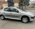 Серый Пежо 206, объемом двигателя 1.9 л и пробегом 220 тыс. км за 1299 $, фото 3 на Automoto.ua