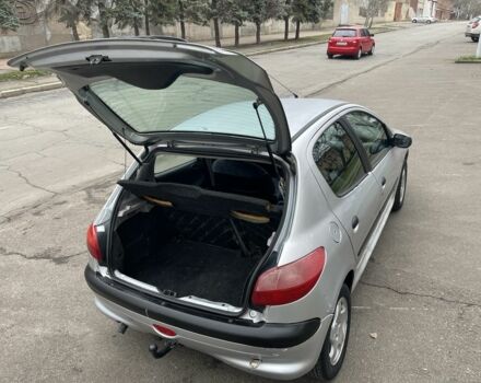 Серый Пежо 206, объемом двигателя 1.9 л и пробегом 220 тыс. км за 1299 $, фото 16 на Automoto.ua