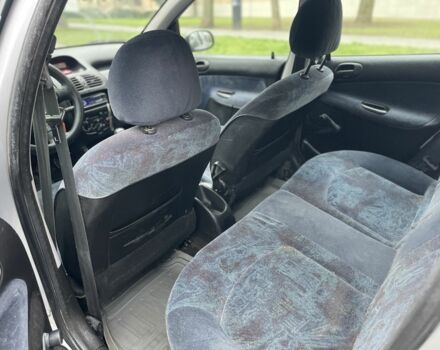 Серый Пежо 206, объемом двигателя 1.9 л и пробегом 220 тыс. км за 1299 $, фото 15 на Automoto.ua