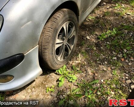 Сірий Пежо 206, об'ємом двигуна 1.4 л та пробігом 160 тис. км за 1300 $, фото 1 на Automoto.ua