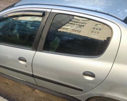Сірий Пежо 206, об'ємом двигуна 1.4 л та пробігом 343 тис. км за 1800 $, фото 4 на Automoto.ua