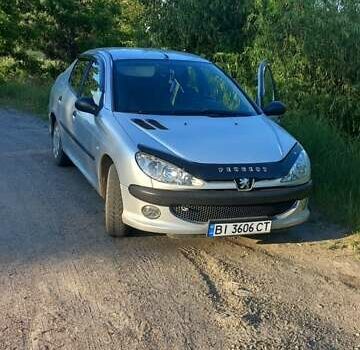 Сірий Пежо 206, об'ємом двигуна 1.36 л та пробігом 230 тис. км за 3100 $, фото 2 на Automoto.ua