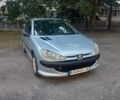 Серый Пежо 206, объемом двигателя 1.4 л и пробегом 390 тыс. км за 2099 $, фото 1 на Automoto.ua