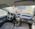 Серый Пежо 206, объемом двигателя 1.36 л и пробегом 150 тыс. км за 3500 $, фото 16 на Automoto.ua