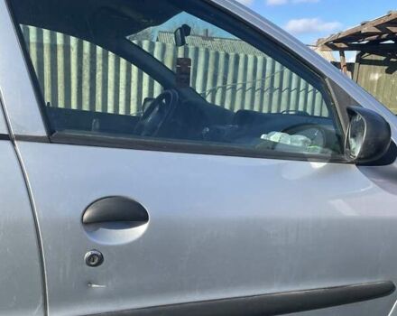 Серый Пежо 206, объемом двигателя 1.36 л и пробегом 150 тыс. км за 3500 $, фото 24 на Automoto.ua