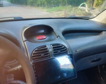 Сірий Пежо 206, об'ємом двигуна 1.4 л та пробігом 343 тис. км за 1800 $, фото 3 на Automoto.ua
