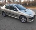 Серый Пежо 206, объемом двигателя 1.4 л и пробегом 250 тыс. км за 2650 $, фото 2 на Automoto.ua