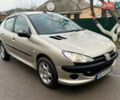 Серый Пежо 206, объемом двигателя 1.36 л и пробегом 218 тыс. км за 2500 $, фото 4 на Automoto.ua