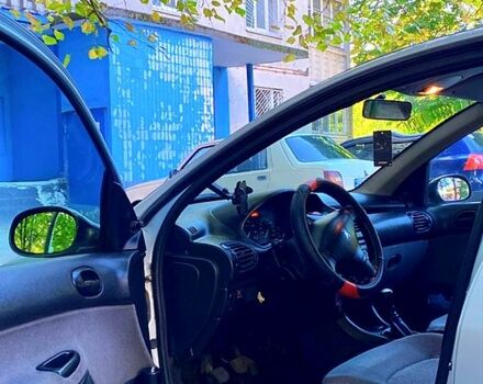 Серый Пежо 206, объемом двигателя 1.4 л и пробегом 116 тыс. км за 3499 $, фото 8 на Automoto.ua