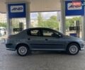 Сірий Пежо 206, об'ємом двигуна 1.36 л та пробігом 245 тис. км за 4499 $, фото 3 на Automoto.ua