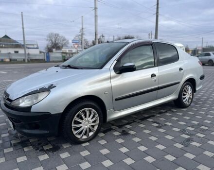 Серый Пежо 206, объемом двигателя 1.4 л и пробегом 250 тыс. км за 1900 $, фото 18 на Automoto.ua