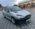 Серый Пежо 206, объемом двигателя 1.4 л и пробегом 250 тыс. км за 1900 $, фото 8 на Automoto.ua