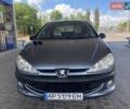 Серый Пежо 206, объемом двигателя 1.36 л и пробегом 245 тыс. км за 4499 $, фото 1 на Automoto.ua