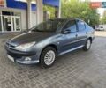 Сірий Пежо 206, об'ємом двигуна 1.36 л та пробігом 245 тис. км за 4499 $, фото 1 на Automoto.ua