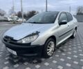 Серый Пежо 206, объемом двигателя 1.4 л и пробегом 250 тыс. км за 1900 $, фото 20 на Automoto.ua