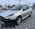Серый Пежо 206, объемом двигателя 1.4 л и пробегом 250 тыс. км за 1900 $, фото 16 на Automoto.ua