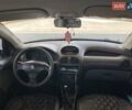 Серый Пежо 206, объемом двигателя 1.36 л и пробегом 245 тыс. км за 4499 $, фото 14 на Automoto.ua